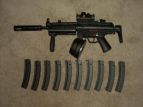 MP5 with drum and some extra mags