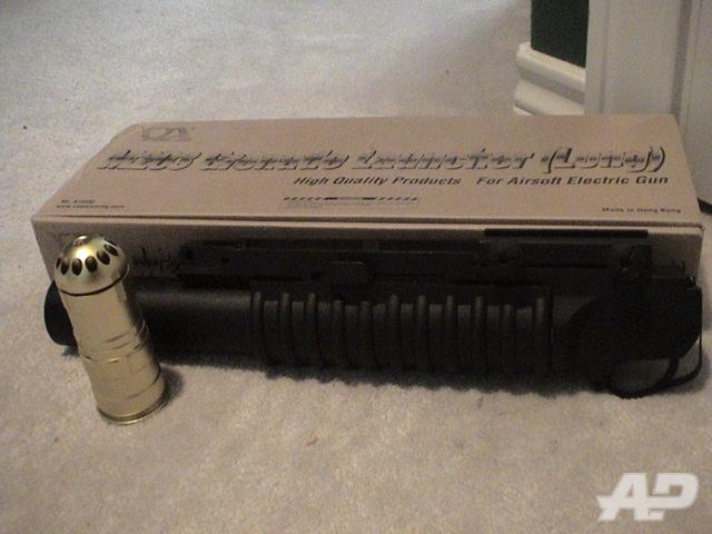 M203